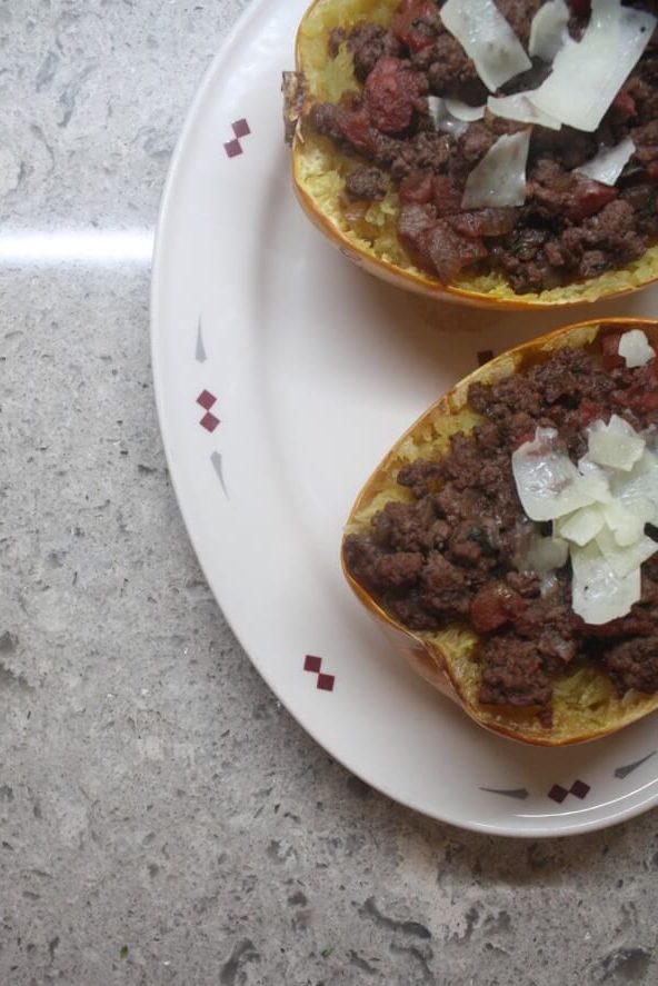 overhead view of two spaghetti squash boats on platter